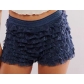 European and American sexy beach hot pants ruffled wave solid color Lolita low waist shorts skirt pants women