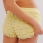 European and American sexy beach hot pants ruffled wave solid color Lolita low waist shorts skirt pants women